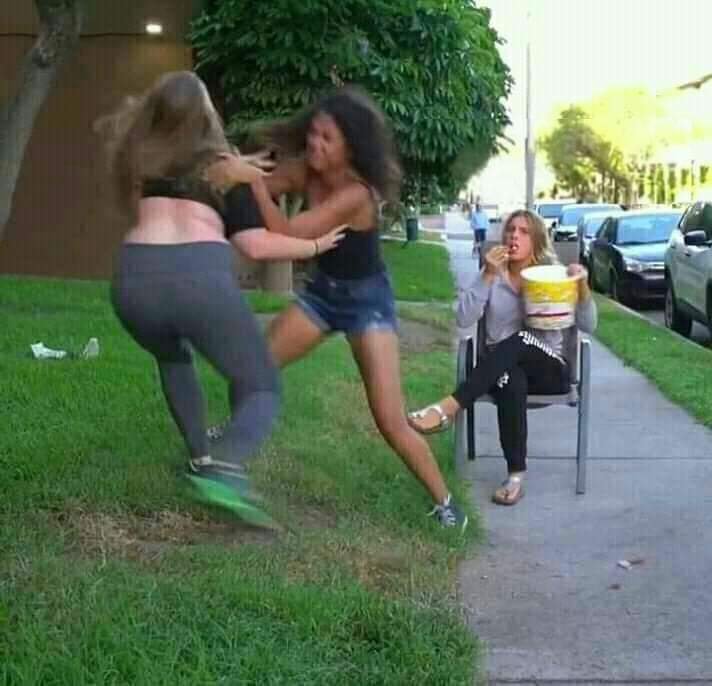 Two Girls Fighting And One Girl Sitting & Watching Them