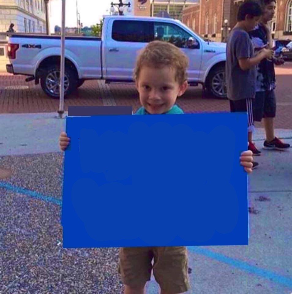 Kid Holding a Blank Board-Kid quoting on road with blue board-latest meme template