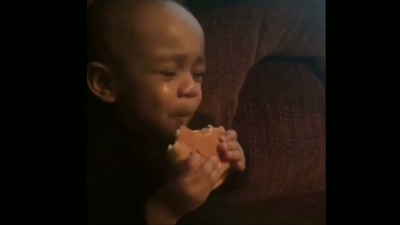 little-kid-crying-and-eating-burger